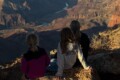 Visitors overlooking the Grand Canyon South Rim in Arizona
