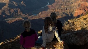 Visitors overlooking the Grand Canyon South Rim in Arizona