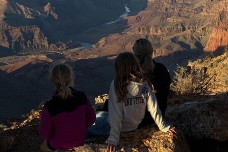 Visitors overlooking the Grand Canyon South Rim in Arizona